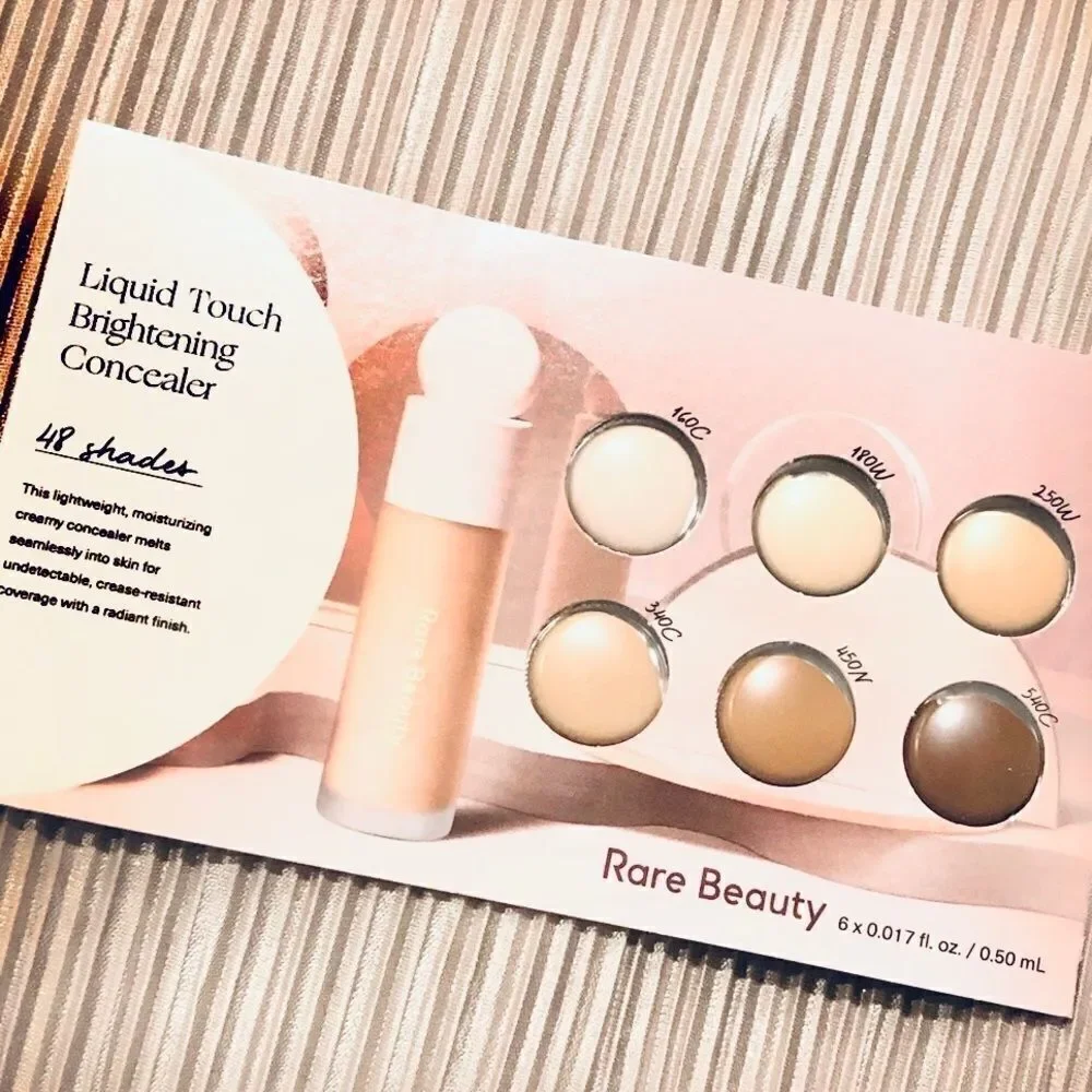 RARE BEAUTY Liquid Touch Brightening Concealer.